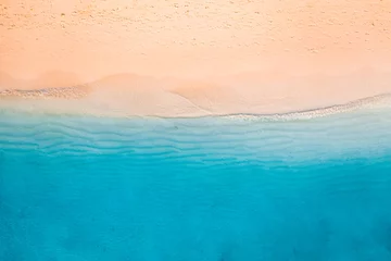 Fototapeten Relaxing aerial beach scene. Summer vacation holiday landscape banner. Waves surf crash amazing blue ocean lagoon, sea shore, coastline. Perfect aerial drone top view. Peaceful bright beach, seaside © icemanphotos