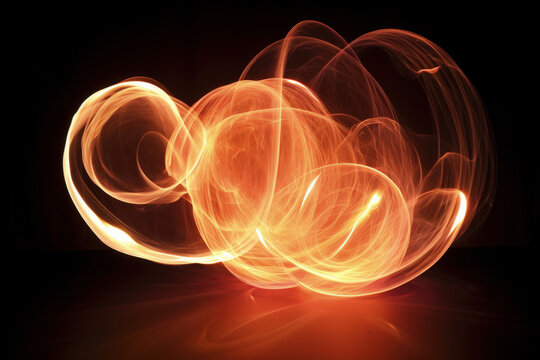 Long-exposure shot of illuminated poi spinning isolated on a white background 