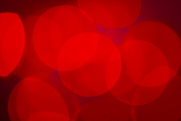 Red light bokeh for holiday lights background or Christmas background