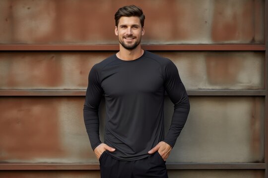 Portrait of a glad man in his 30s wearing a moisture-wicking running shirt against a vintage brick wall. AI Generation