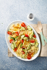 Couscous salad with grilled cheese and vegetables