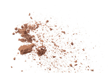 Cocoa powder fall fly in mid air, Cocoa powder floating explosion. Cocoa powder Chocolate chip crunch throw in air. White background isolated freeze motion high speed shutter