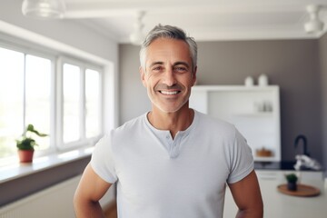 Portrait of a joyful man in his 50s donning a classy polo shirt against a modern minimalist interior. AI Generation