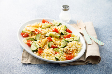 Couscous salad with grilled cheese and vegetables