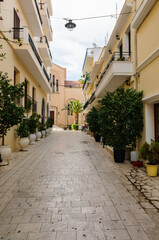 Fototapeta na wymiar Street in the Greek town of Zakynthos with traditional houses