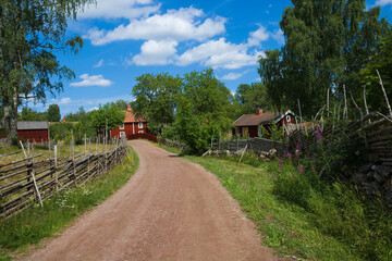 Well preserved old historical hamlet and the surrounding landscape in Stensjo by, Sweden - 678169641