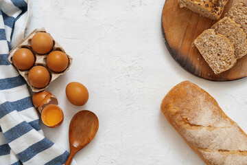 Preparation for baking. Eggs and flour on white background