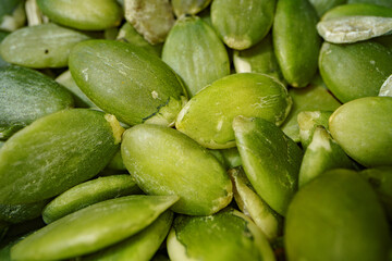Macro photo of pumpkin seeds texture background