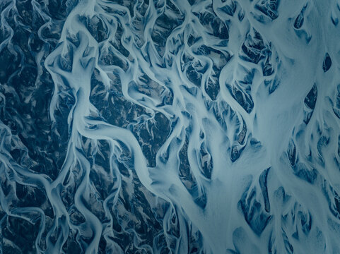 Aerial Serenity: Icelandic Glacial Rivers in Nature's Paintbrush
