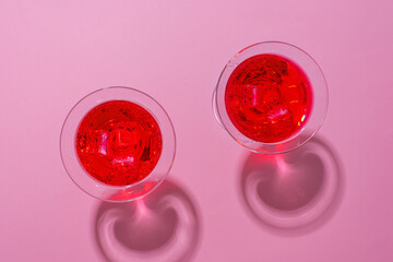 Cold and refreshing cocktails on color background
