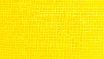 Yellow sackcloth woven texture background in natural pattern.