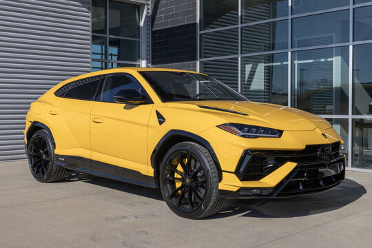 Lamborghini Urus S SUV display at a dealership. Lamborghini offers the Urus in S and Performante models.