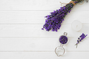 Dry lavender flowers on wooden background close up
