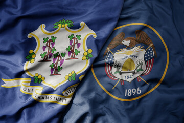 big waving colorful national flag of utah state and flag of connecticut state . - obrazy, fototapety, plakaty