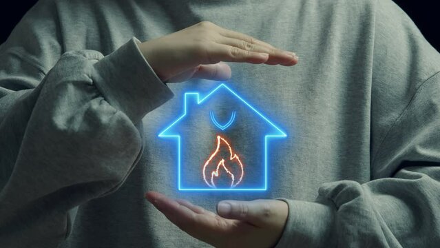 Human holding a illustration house with shield guard with fire. Protection and home and fire insurance concept.
