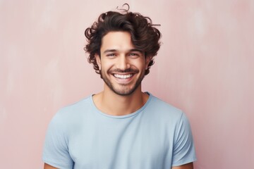 Portrait of a smiling man in his 30s donning a trendy cropped top against a pastel gray background. AI Generation