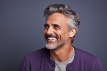 Obraz premium Portrait of a blissful man in his 40s wearing a trendy sunglasses against a pastel gray background. AI Generation