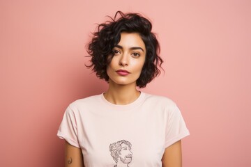 Portrait of a glad woman in her 20s sporting a vintage band t-shirt against a soft pink background. AI Generation
