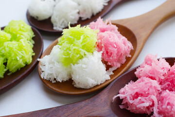 Sweet coconut balls, crispy coconut candies (Maprao Gaew). Thai traditional dessert