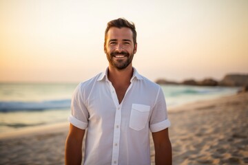 Portrait of a content man in his 30s wearing a simple cotton shirt against a vibrant beach sunset background. AI Generation