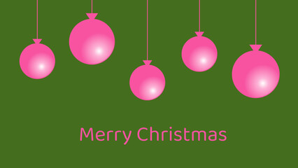 Pink Christmas balls on green background as a card