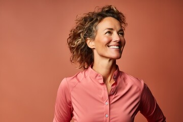 Portrait of a jovial woman in her 40s sporting a technical climbing shirt against a pastel or soft colors background. AI Generation