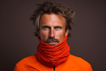 Portrait of a content man in his 40s wearing a protective neck gaiter against a solid color backdrop. AI Generation