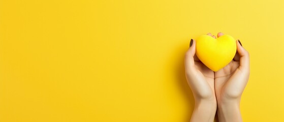 Sunshine of Love: Grasping a Yellow Heart with Joy