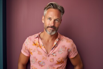Obraz premium Portrait of a jovial man in his 40s donning a trendy cropped top against a scandinavian-style interior background. AI Generation