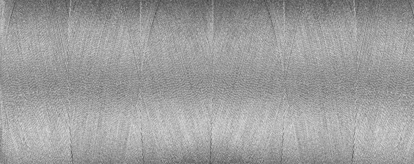 texture of thread for a sewing machine gray colors on a white background - Powered by Adobe