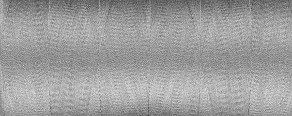 Foto op Canvas texture of thread for a sewing machine gray colors on a white background © Minakryn Ruslan 
