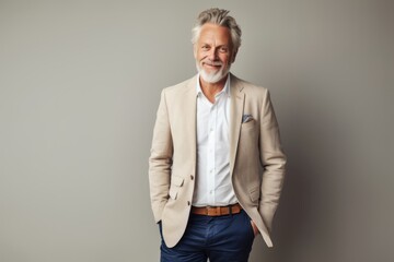 Fototapeta premium Portrait of a cheerful man in his 50s dressed in a stylish blazer against a light wood minimalistic setup. AI Generation
