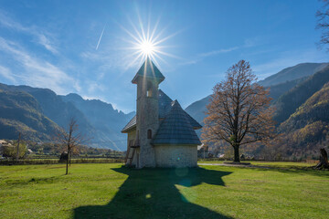 albania theth national park and stone church among mountains blue sky over valley - obrazy, fototapety, plakaty