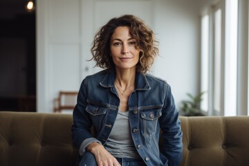 Fototapeta na wymiar Portrait of a content woman in her 40s sporting a rugged denim jacket against a crisp minimalistic living room. AI Generation