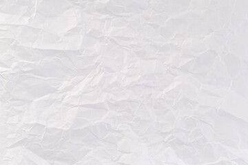 Background from an empty crumpled sheet of white office paper.