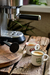 cup of coffee on wooden table