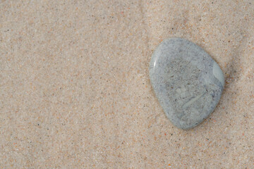pebble on the beach. top view