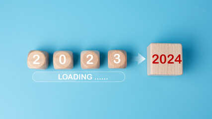 Wooden blocks lined up with the letters 2023. Represents the goal setting for 2024, the concept of a start. financial planning development strategy business goal setting