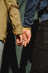 Close holding hands