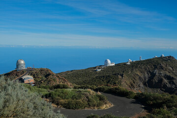 Fototapeta na wymiar View on international space observatory and telescopes on La Palma island located on highest mountain range Roque de los muchachos, sunny day, Canary islands, Spain