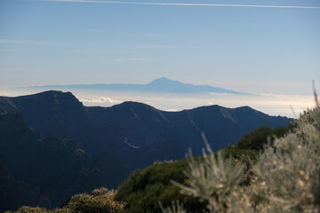 Mount Teide on the island of Tenerife seen from the Roque de los Muchachos viewpoint on La Palma. - 678240606