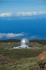 View on international space observatory and telescopes on La Palma island located on highest mountain range Roque de los muchachos, sunny day, Canary islands, Spain - 678240880