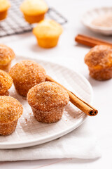 cinnamon and sugar mini muffins cupcakes, a sweet bite-sized aromatic and dessert on a white plate