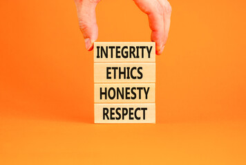 Integrity ethics honesty respect symbol. Concept word Integrity Ethics Honesty Respect on block....
