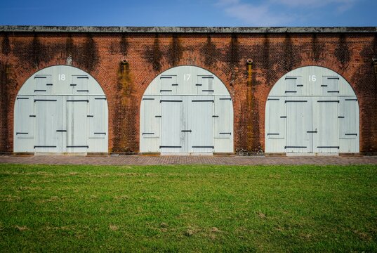 Three wooden doors at the Fort Pulaski National Monument in Cockspur Island, Georgia 