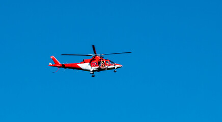 Fototapeta na wymiar Medical helicopter rescue operation in the Tatras