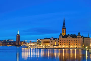 Foto auf Glas Stockholm Sweden, night city skyline at Stockholm City Hall and Gamla Stan © Noppasinw