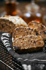 Close up view of artisan rye bread with dried apricots, prunes and seeds