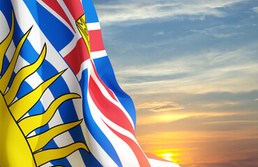 British Columbia flag against the sunset. Province of Canada - obrazy, fototapety, plakaty