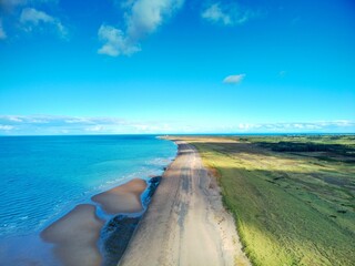 Aerial view of the beautiful Point of Ayre Beach during summer